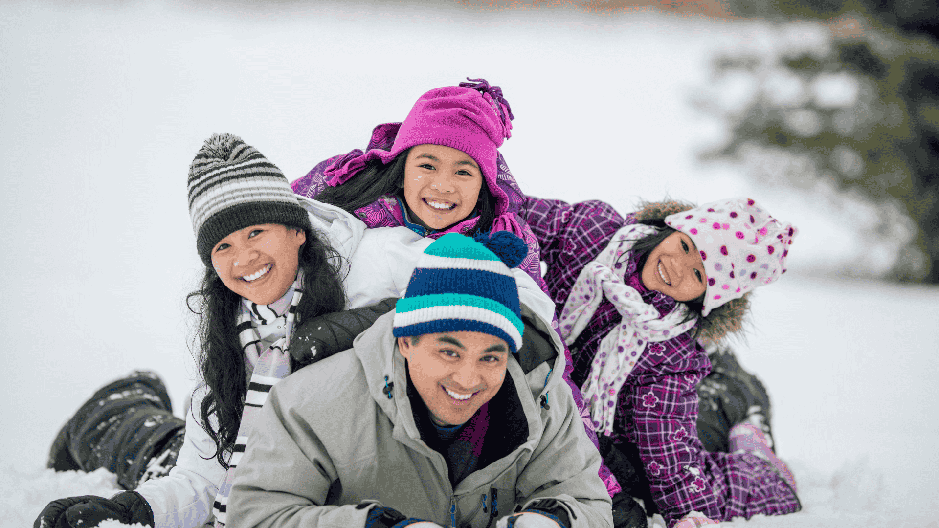 Families attending an outdoor festival in Merrimack Valley during late winter