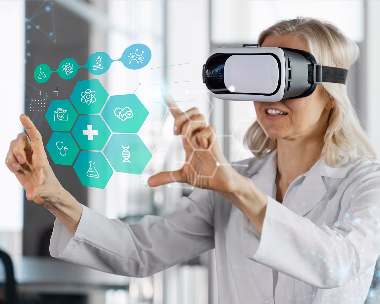A woman in a white chemist overall wearing a VR headset using her hands to manipulating medical elements in the digital world