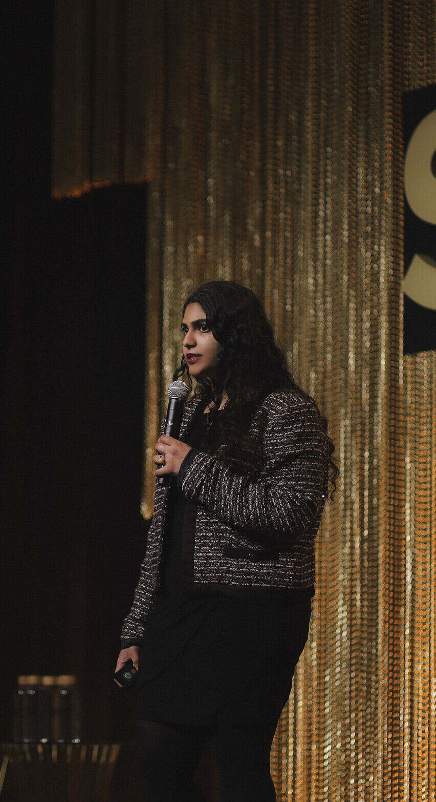 Amrita Bhasin speaking at Shoptalk