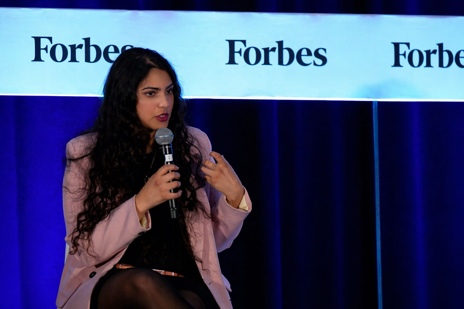 Amrita Bhasin speaking at the Forbes summit