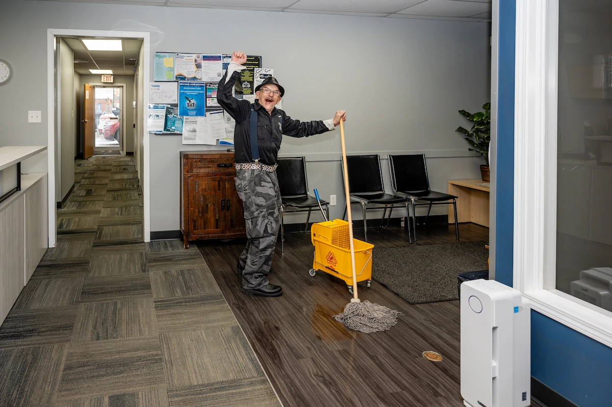 donald cheering while mopping