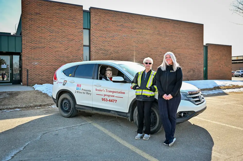senior, volunteer driver, and admin member at volunteer transportation car