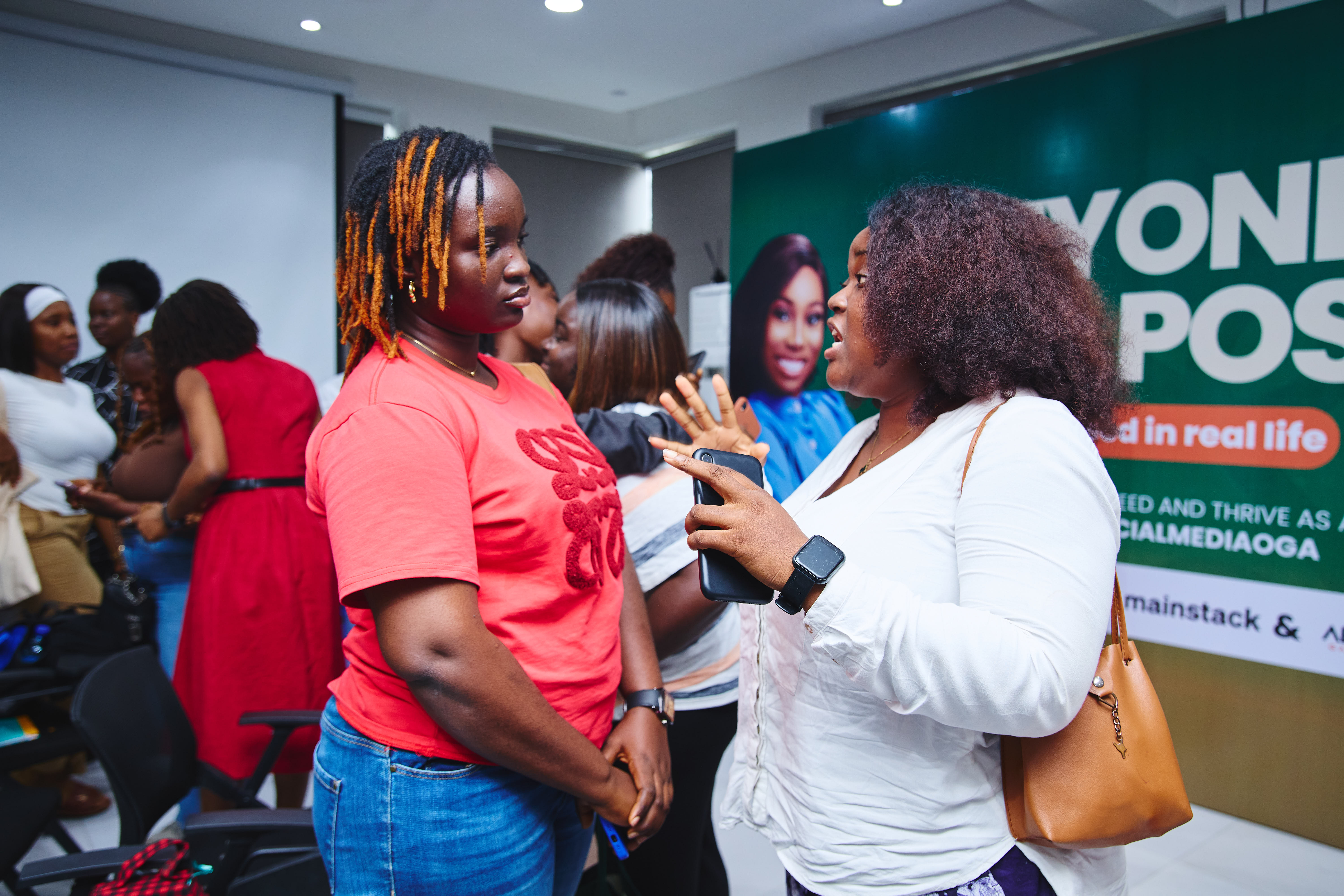 Attendees at the event networking and interacting with each other