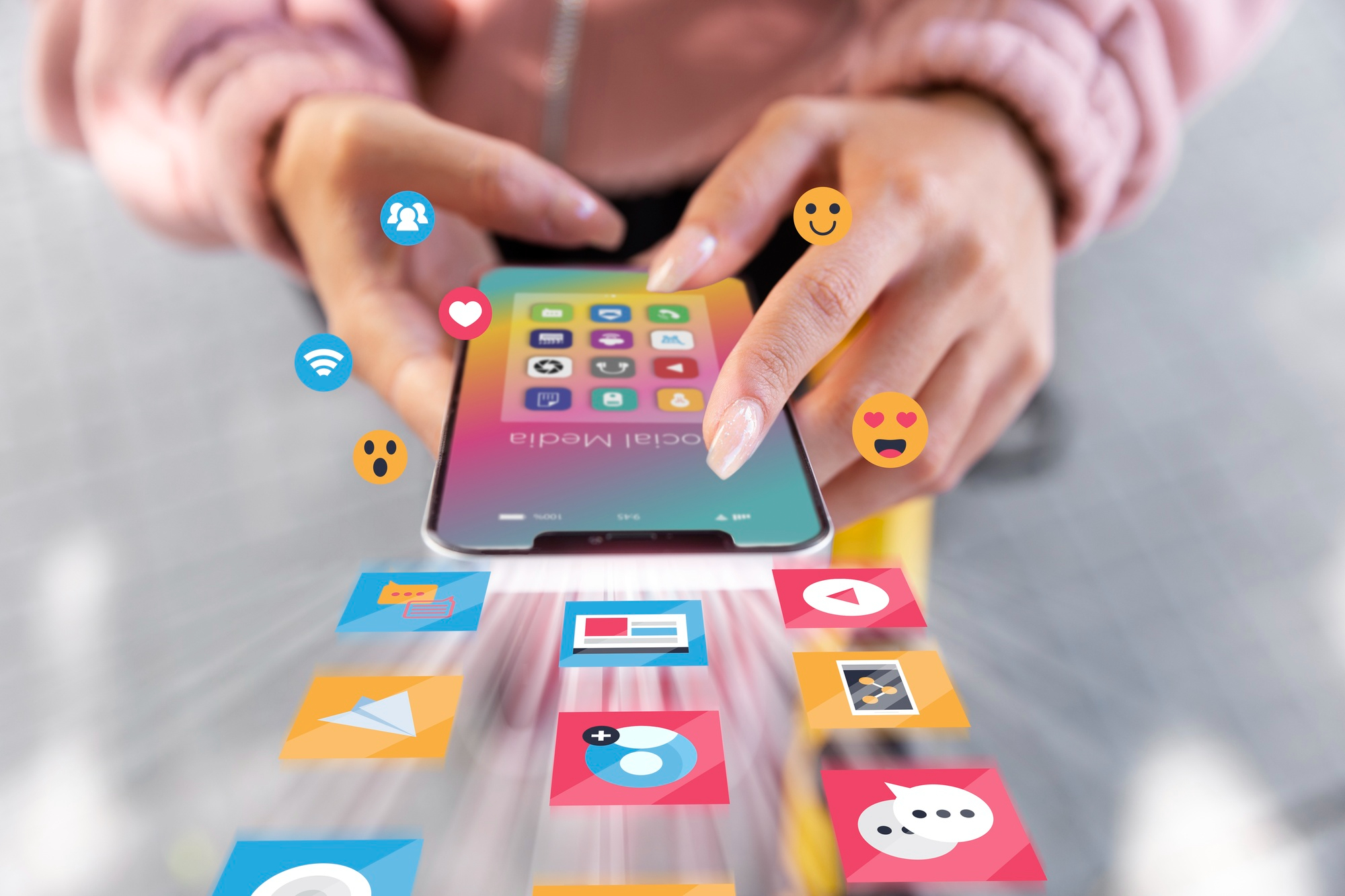 A woman holding a mobile phone with notifications popping on screen