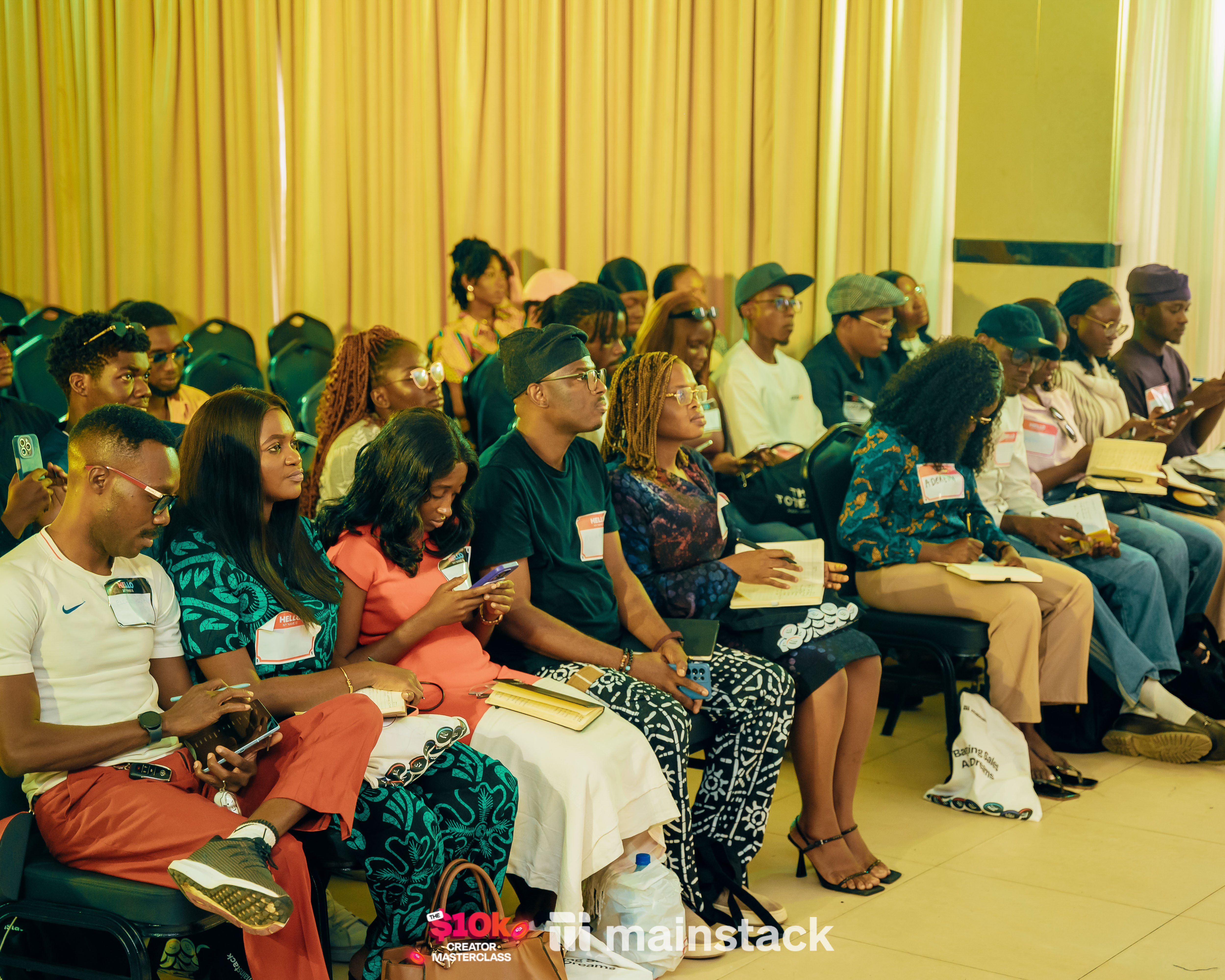Attendees taking notes during Paul Foh's session