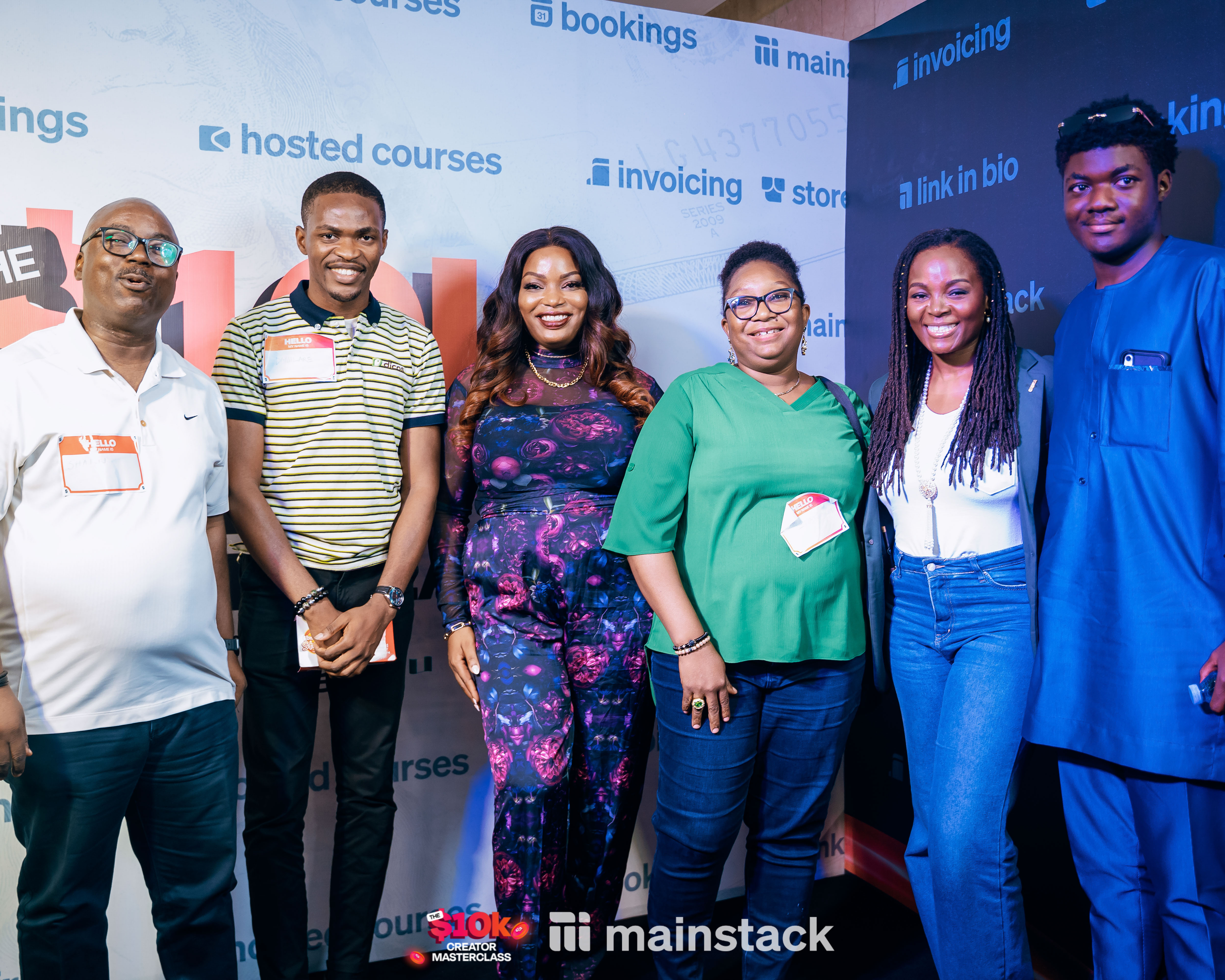 Tricia Biz and Joyce Daniels with some attendees on the black carpet at the 10k creator masterclass 