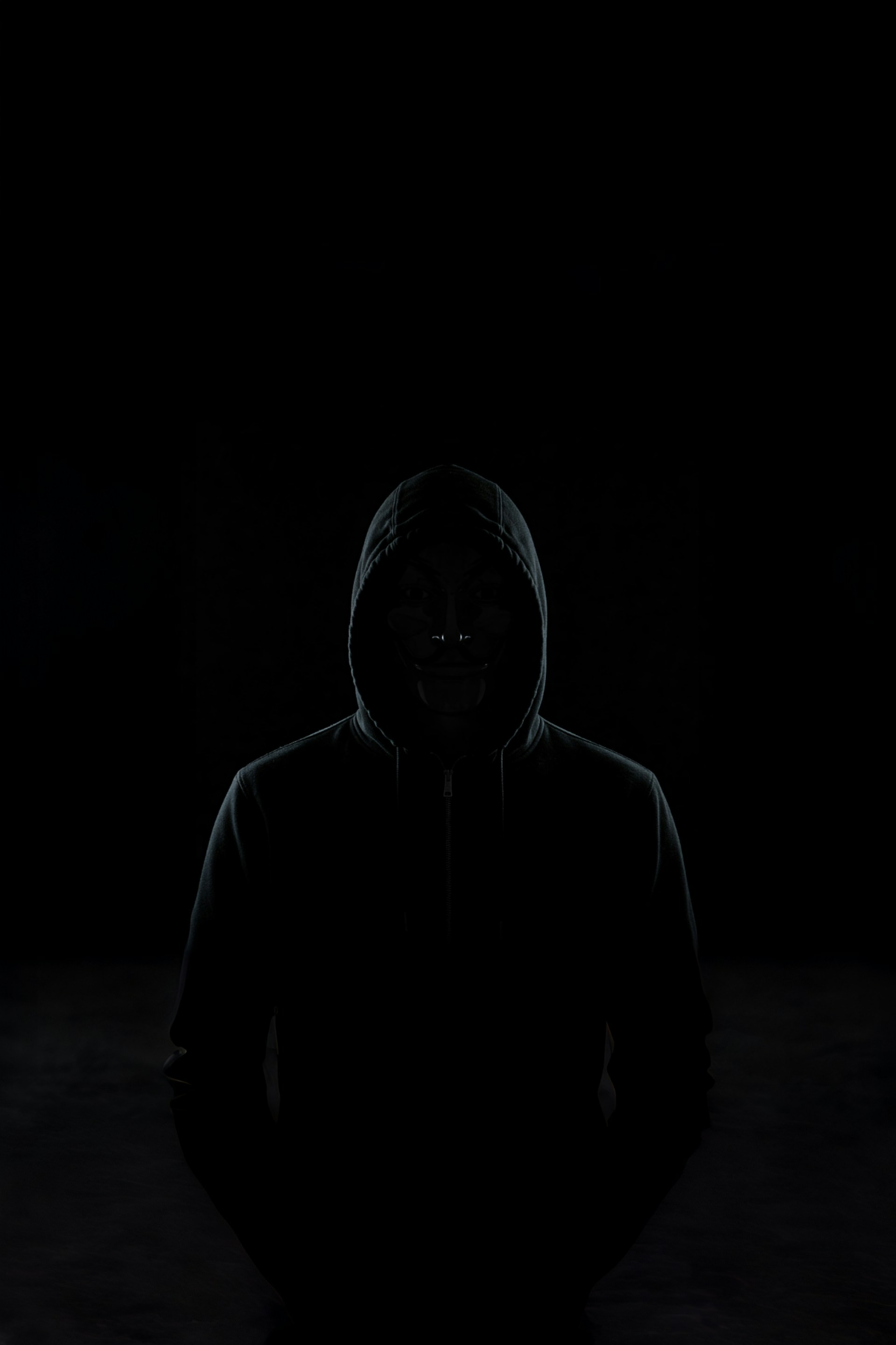 A hacker dressed in a hoodie