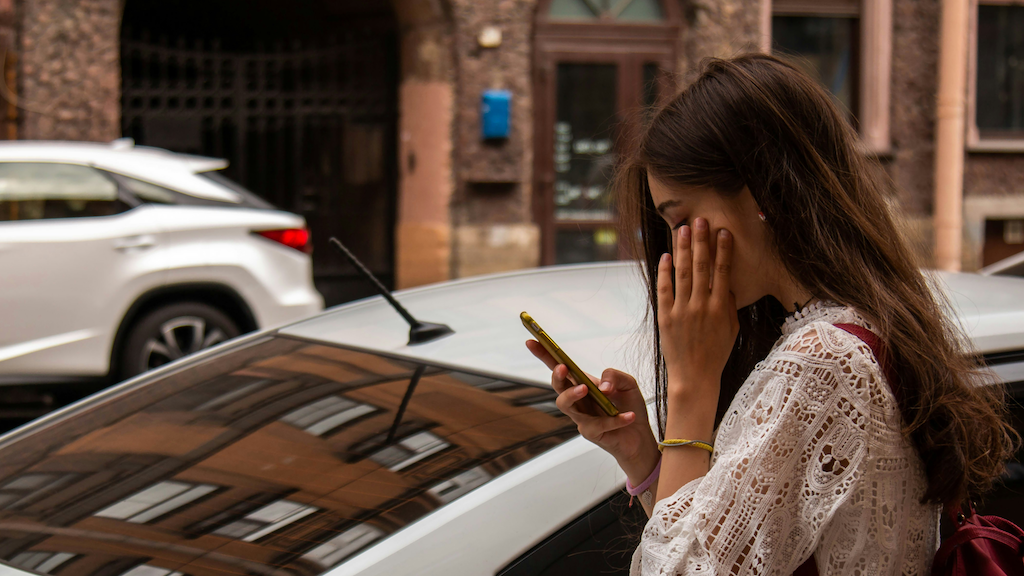 An image of a female delivery driver working for Favor Delivery