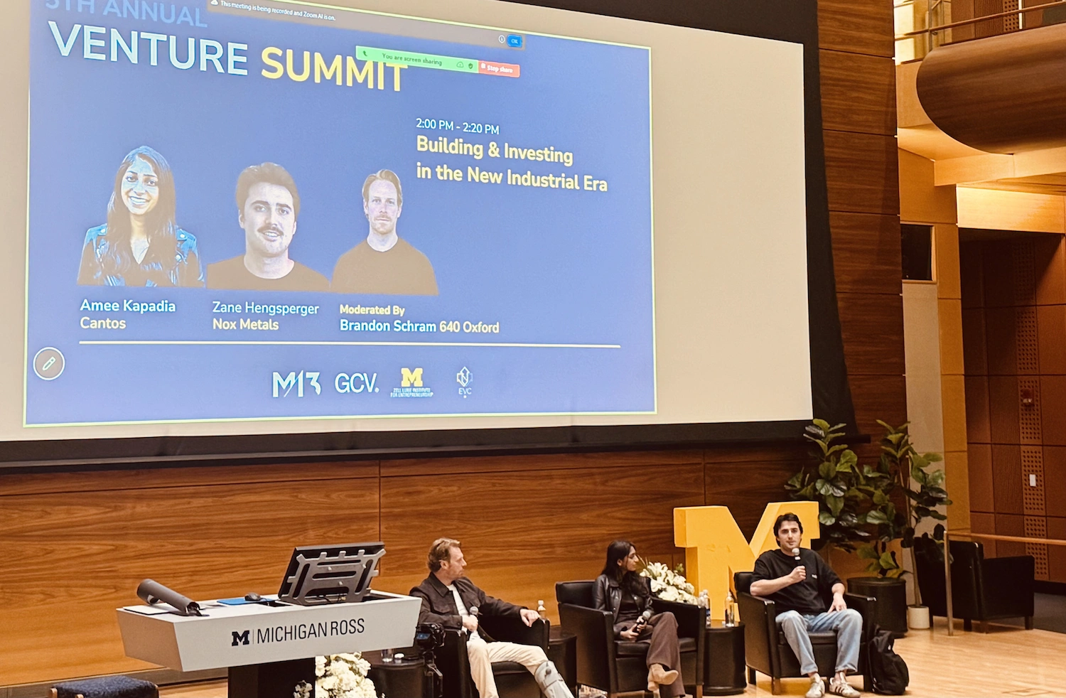 Zane Hengsperger, Amee Kapadia and Brandon Schram at the Venture Summit held at the University of Michigan's Ross School of Business