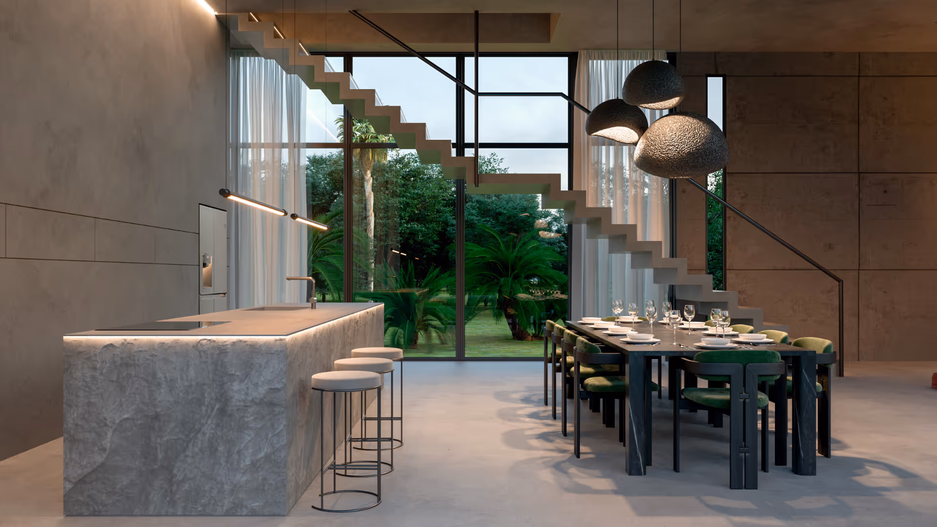 Modern open-plan kitchen and dining area with concrete island, bar stools, black dining table with green chairs, and large floor-to-ceiling windows overlooking lush greenery.