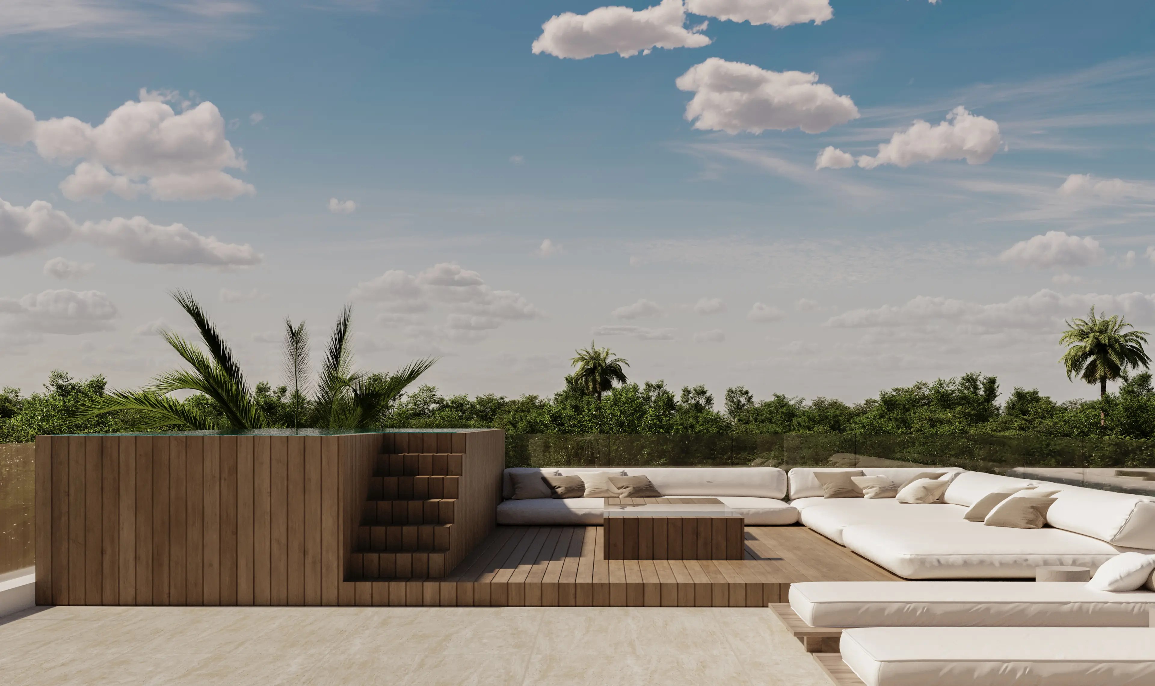 Modern outdoor rooftop lounge with wooden platform, sectional white cushioned seating, coffee table, and a planter with tropical palm plants under a partly cloudy sky.