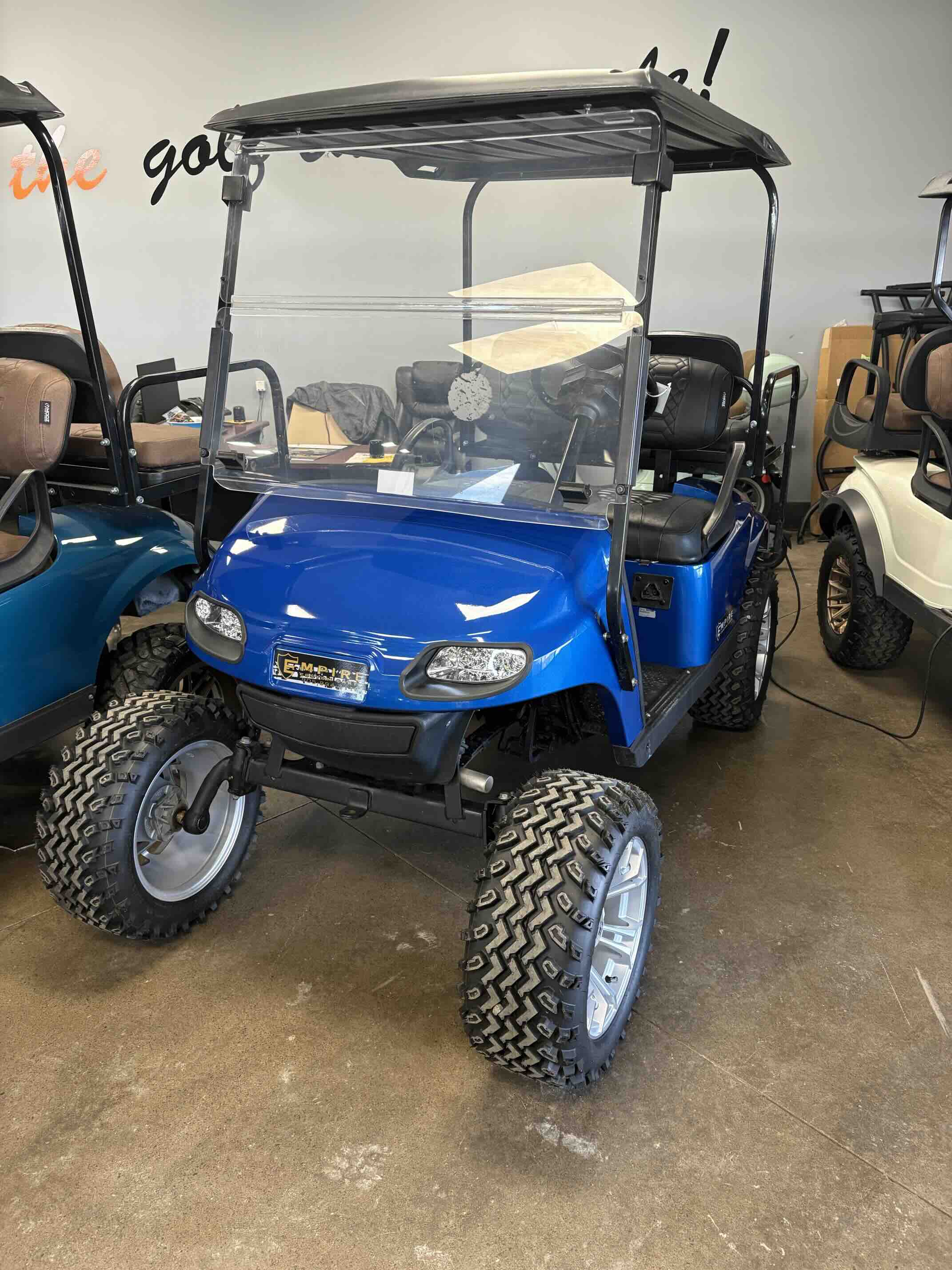 EZGO TXT 4-Passenger golf cart in Blue – Birdie Golf Carts Port Colborne