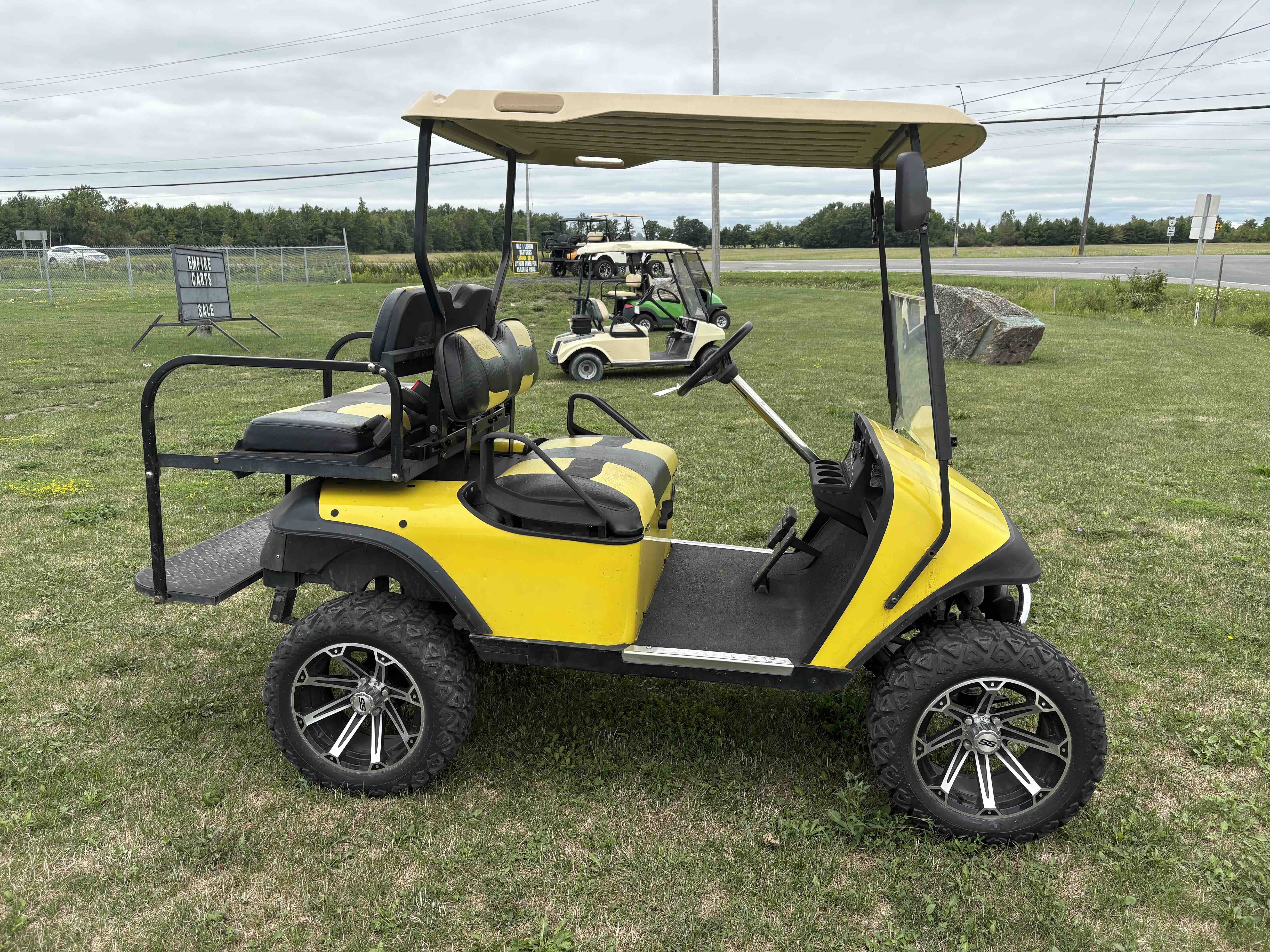 1997 EZGO TXT 4-Passenger golf cart in Yellow – Birdie Golf Carts Port Colborne