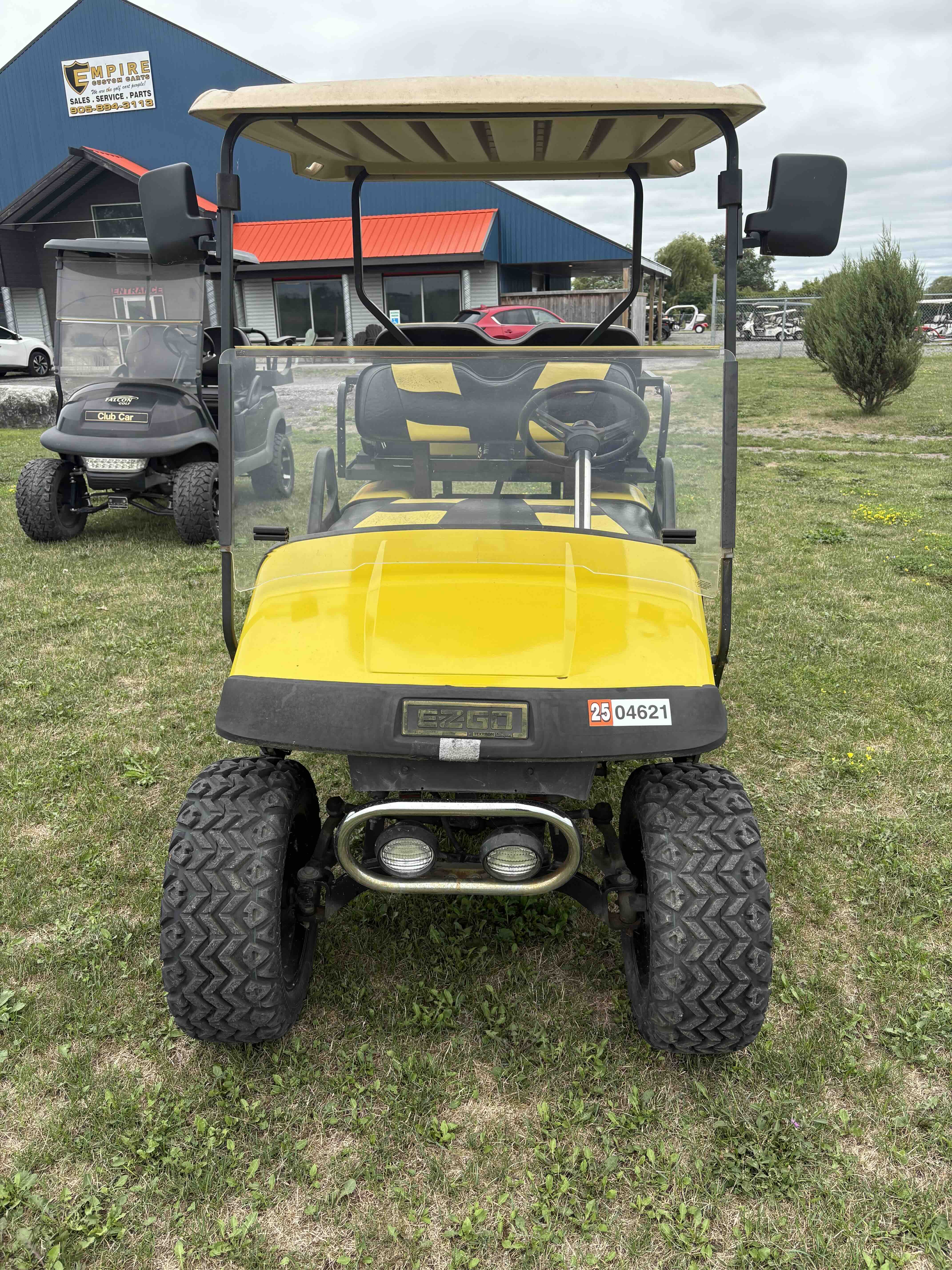 1997 EZGO TXT 4-Passenger golf cart in Yellow – Birdie Golf Carts Port Colborne