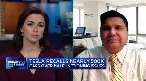 Tesla recall won’t materially affect the stock, says Mizuho’s Vijay Rakesh