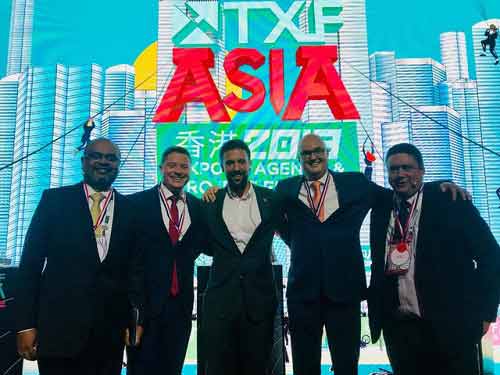 men hugging for a photo