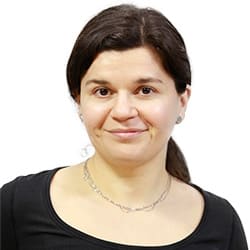 Professional headshot of Andra Belcea