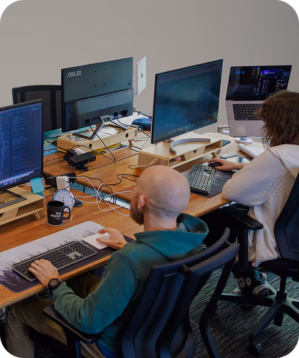 Image of company employees working in office