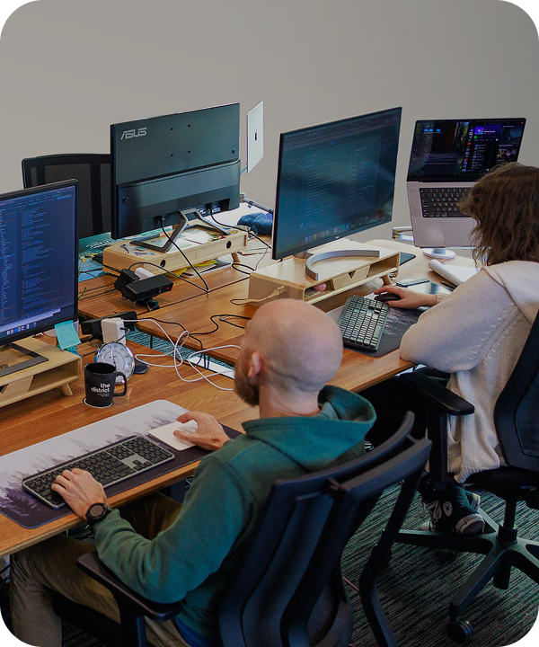 Image of company employees working in office