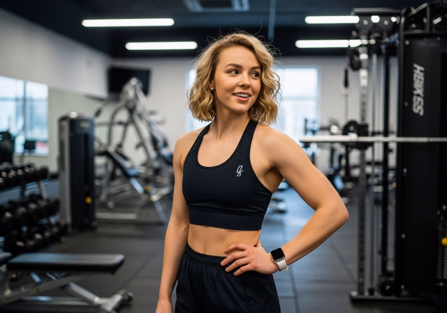 Woman posing in okfitt gear 