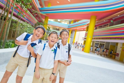 3 young Chinese boys in Nanyang Primary School's courtyard