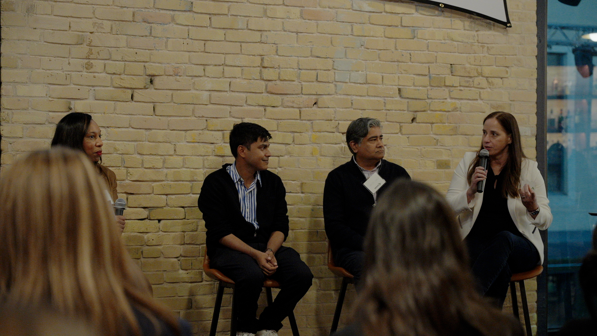 Emily Lewis-Pinnell speaking on the AI Shockwave panel at SXSW 2026