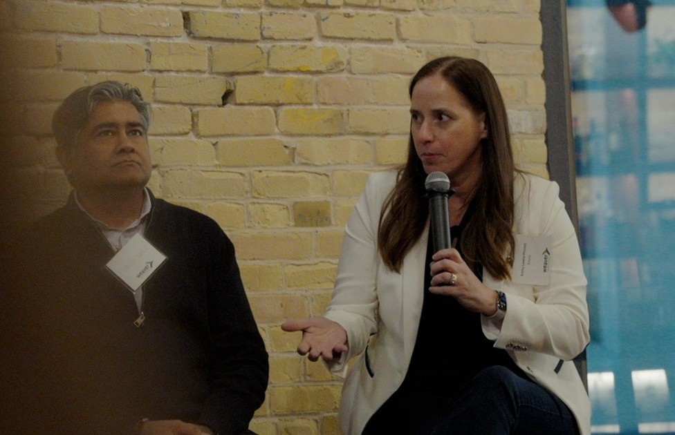 Emily Lewis-Pinnell speaking on the AI Shockwave panel at SXSW 2026