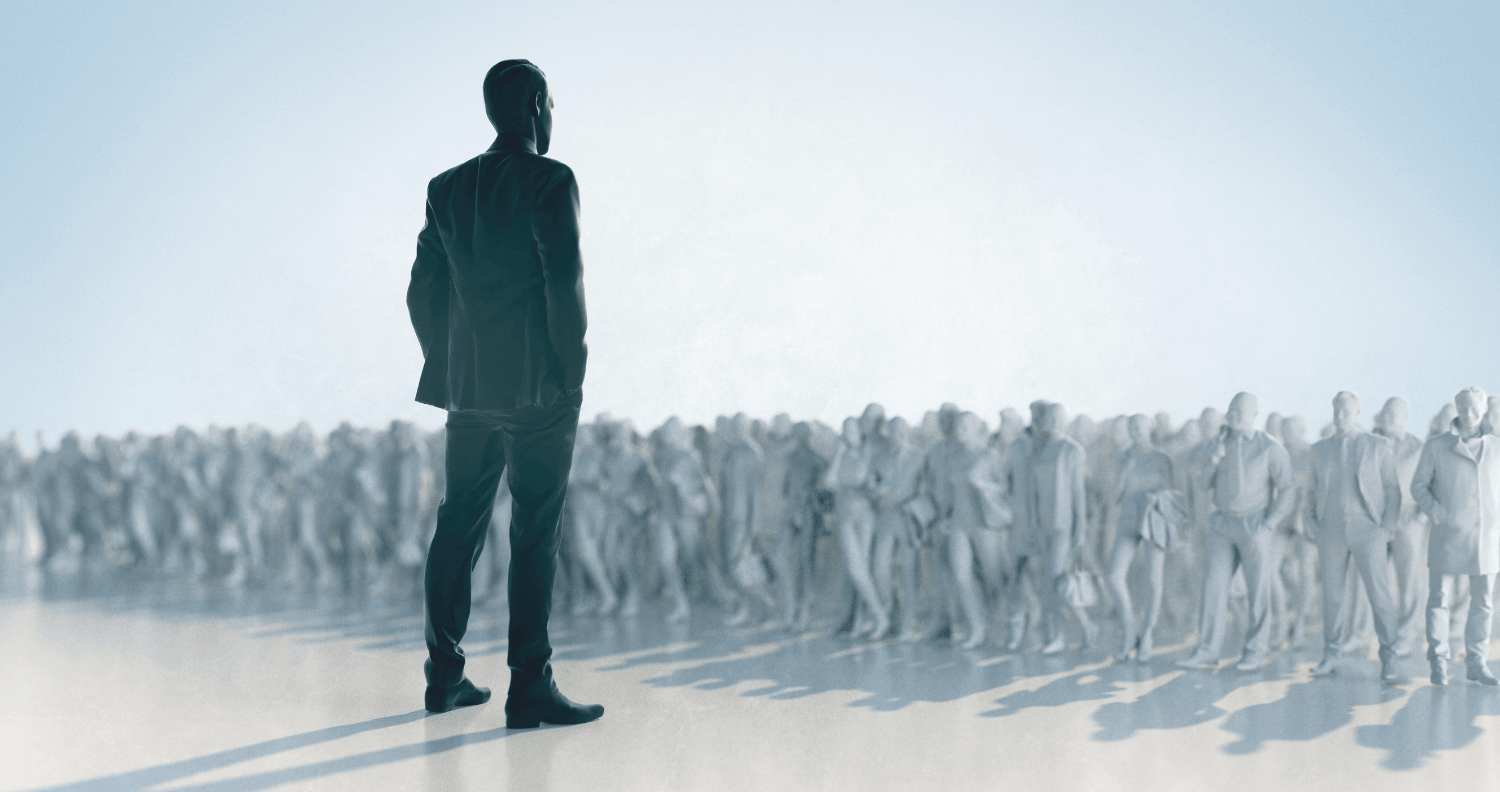 person standing in front of a large crowd, symbolizing leadership and influence
