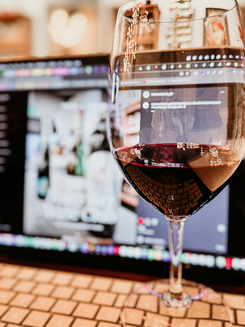 A Brand Above sharing wine at Taste & Savor strategizing on a rainy day special