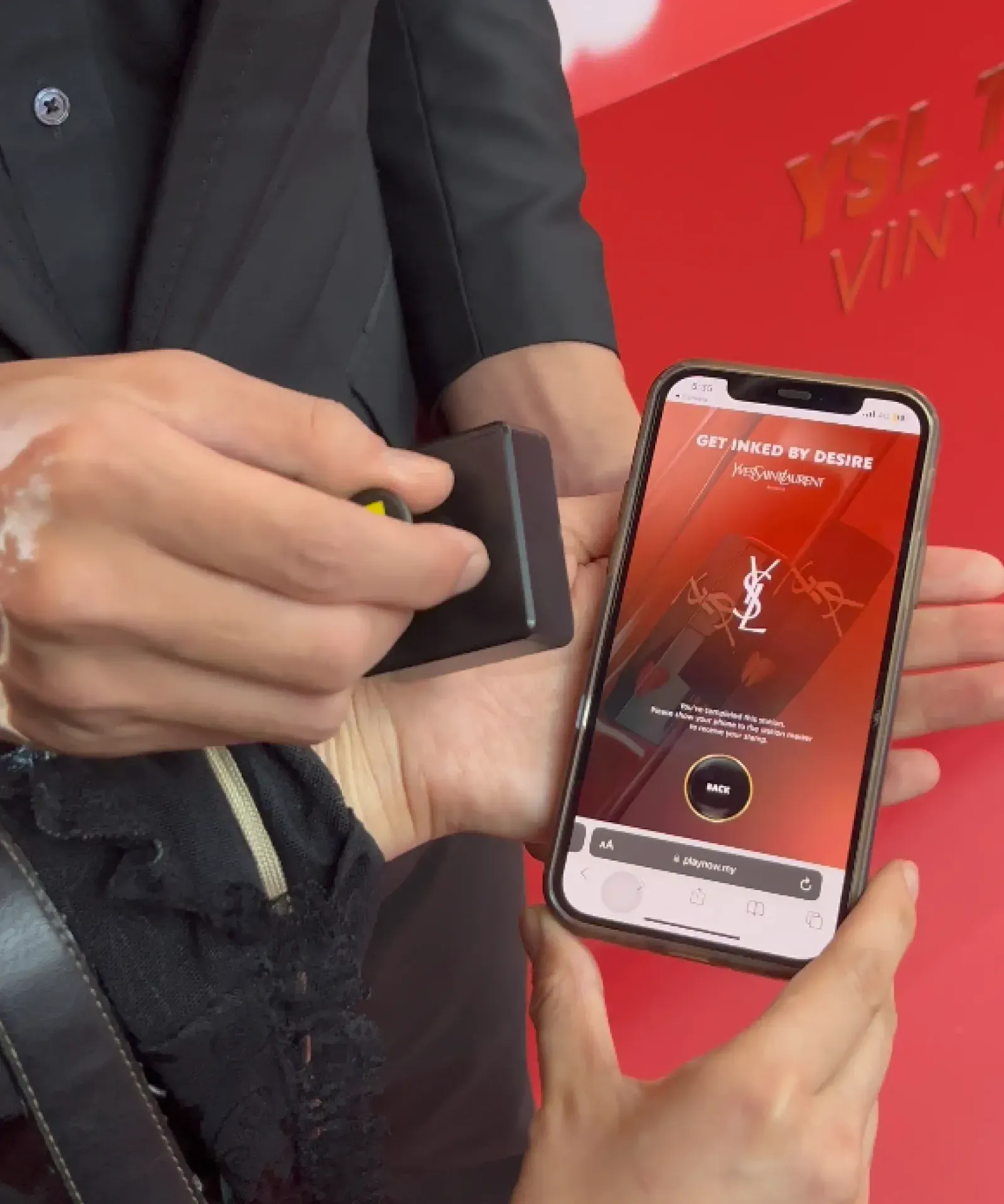 YSL The Inks roadshow smart-stamp wrist scan opening a branded phone experience