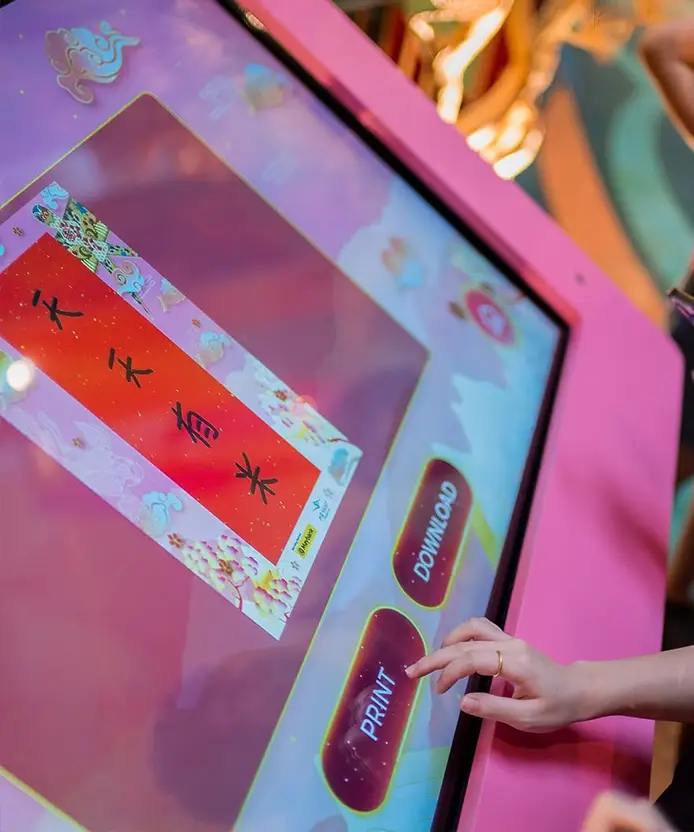 Interactive digital calligraphy drawing wall at Mid Valley shopping mall in Kuala Lumpur