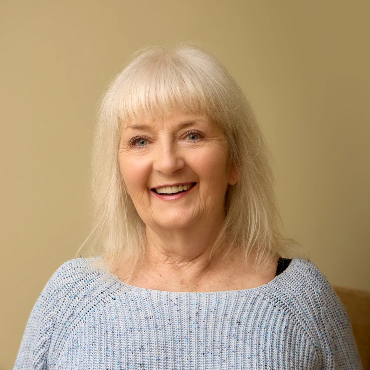 Therapist Ger Hagan seated across from a client during a private therapy session