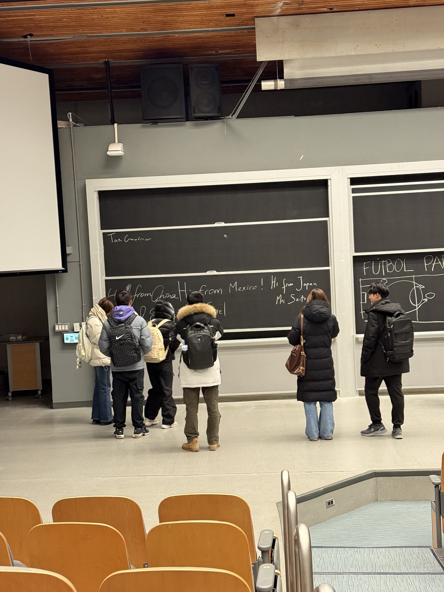 Talking with attendees after his meetup presentation
