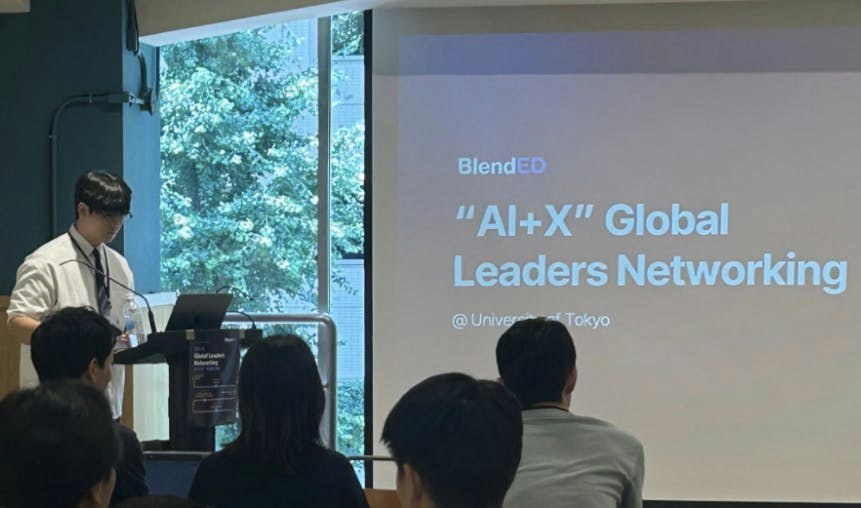 A speaker at the podium, University of Tokyo