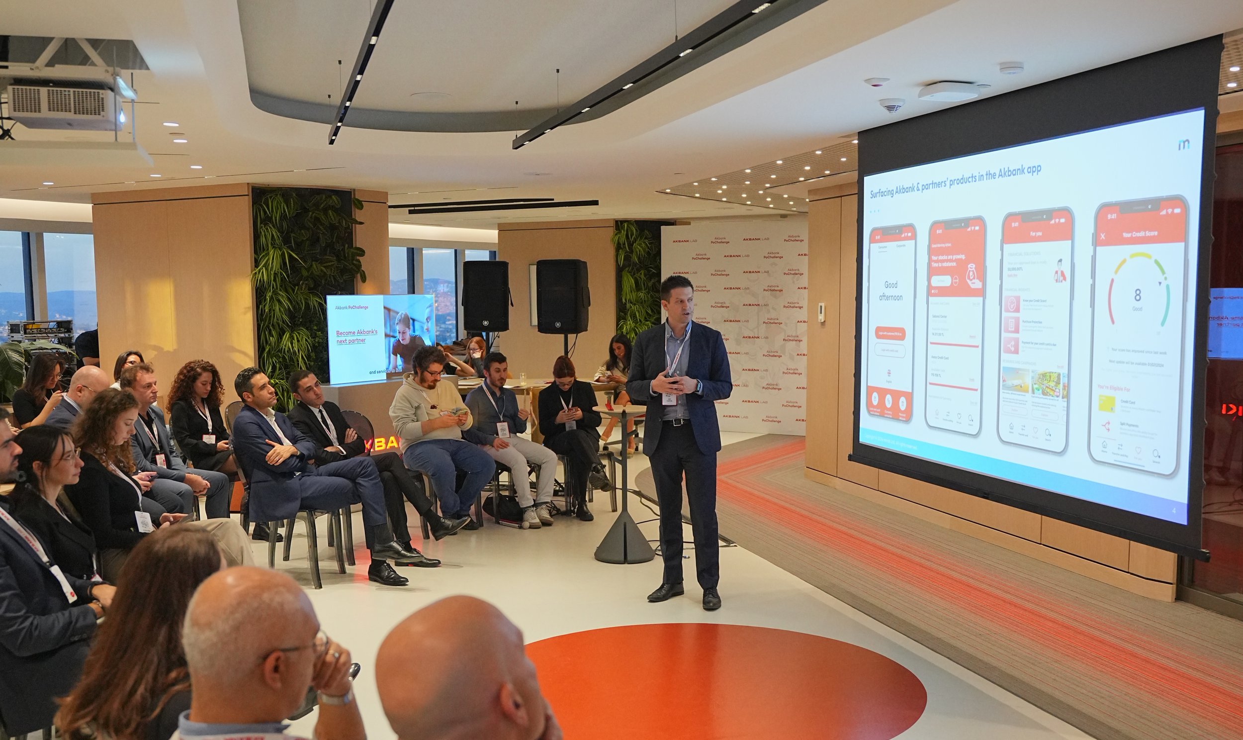 Ian Carter, Group COO of mmob, showcases mmob's solution in the context of AkBank in front of AkBank stakeholders at AkBank lab.