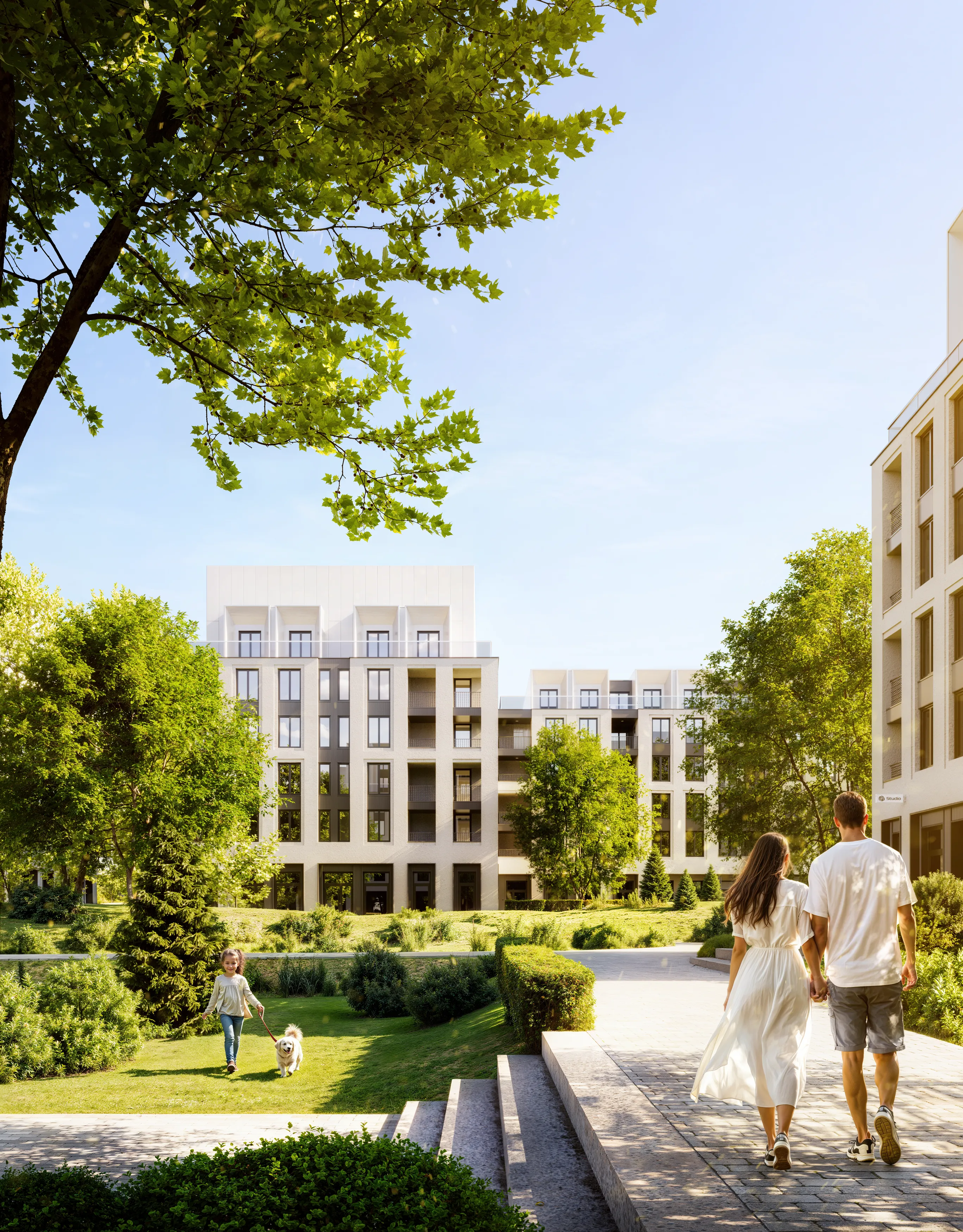 Couple walking hand in hand on a paved path in a modern residential area with green trees and a child walking a small dog on grass nearby.