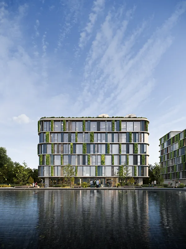 Frontal view of a modern resort building from the pool, with groups of people walking near the water.