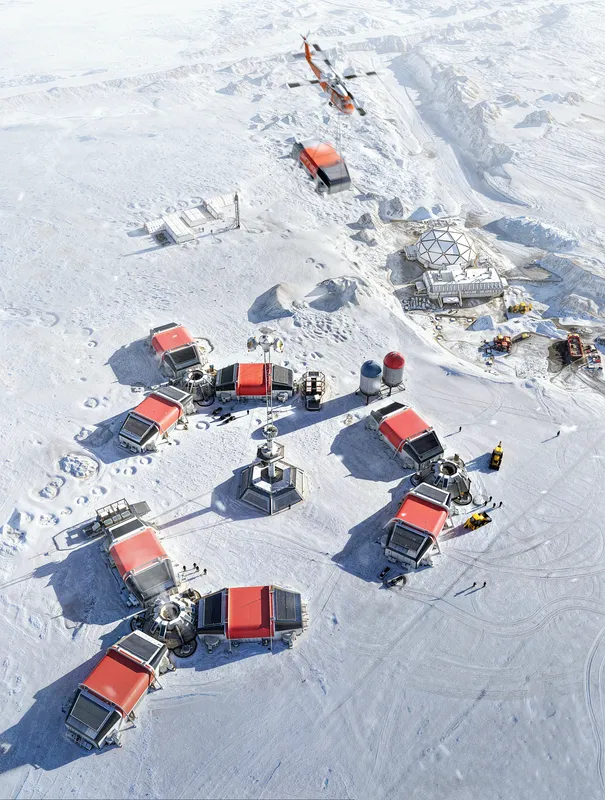 Aerial view of a polar station amidst snowy landscapes.