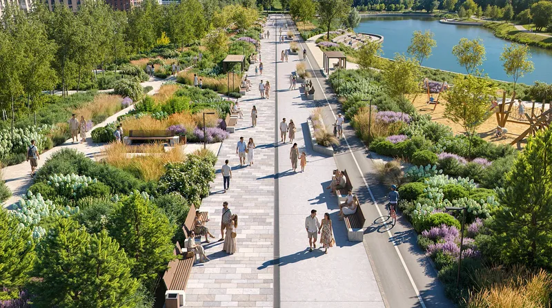 Aerial view of a modern eco-park featuring a lake and walking paths with visitors.