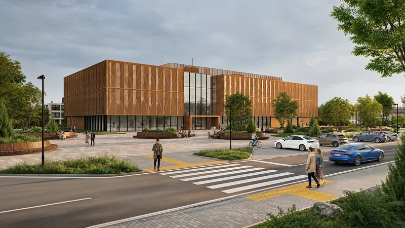 Angled view of a community center, crosswalk, and pedestrians.
