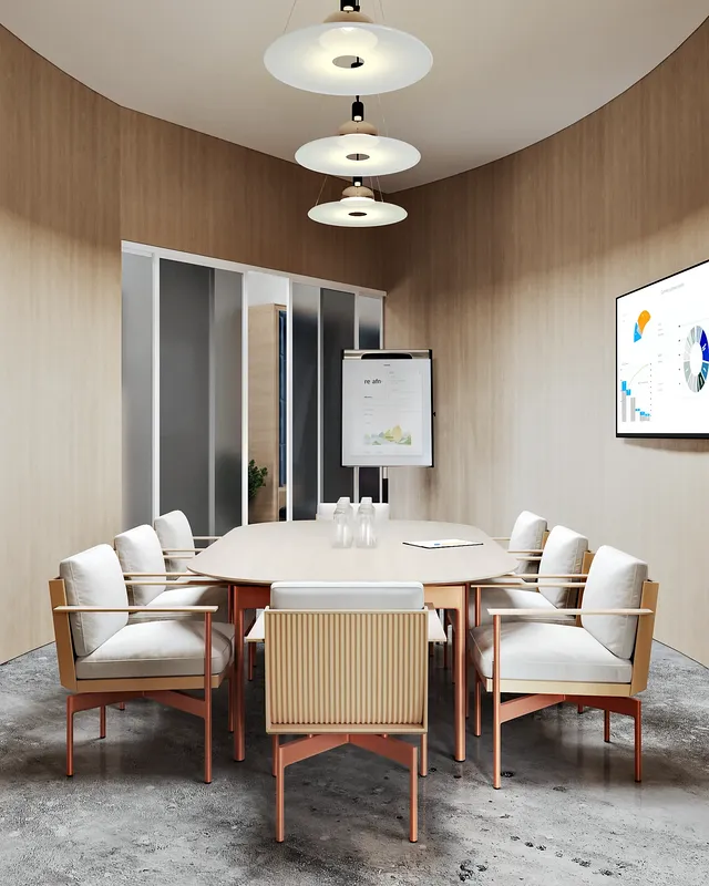 Modern eight-person conference room with a large central table and comfortable chairs.