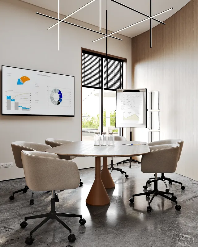 Bright and professional six-person meeting room with a central table.