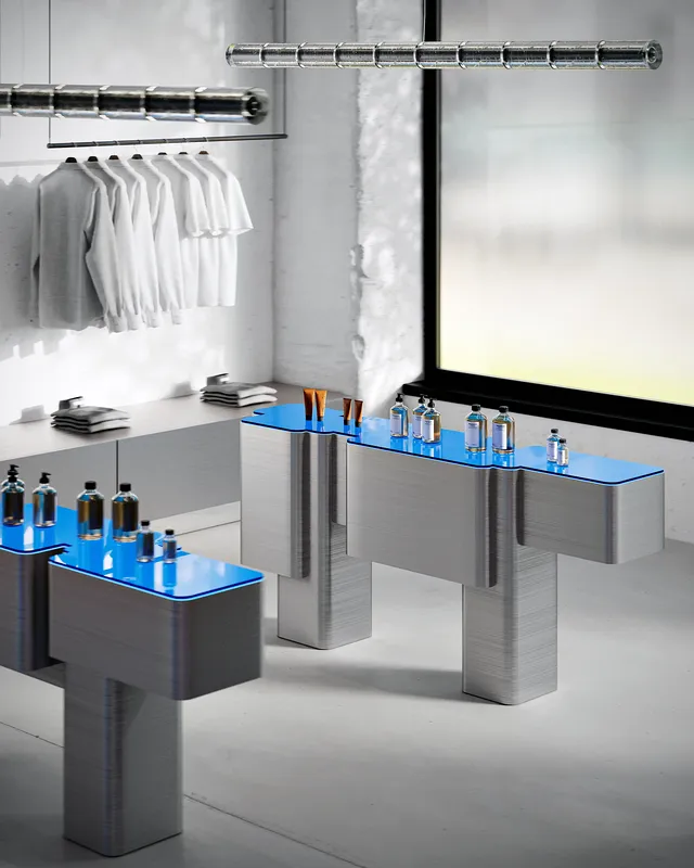 Overhead view of elegantly arranged cosmetic product display stands.