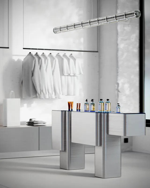 Retail interior showcasing integrated display stands for cosmetics and apparel.