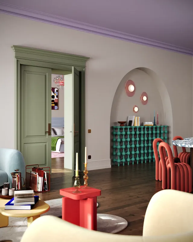 View towards a bedroom entrance in a Pop Art interior, flanked by quirky, modern coffee tables.