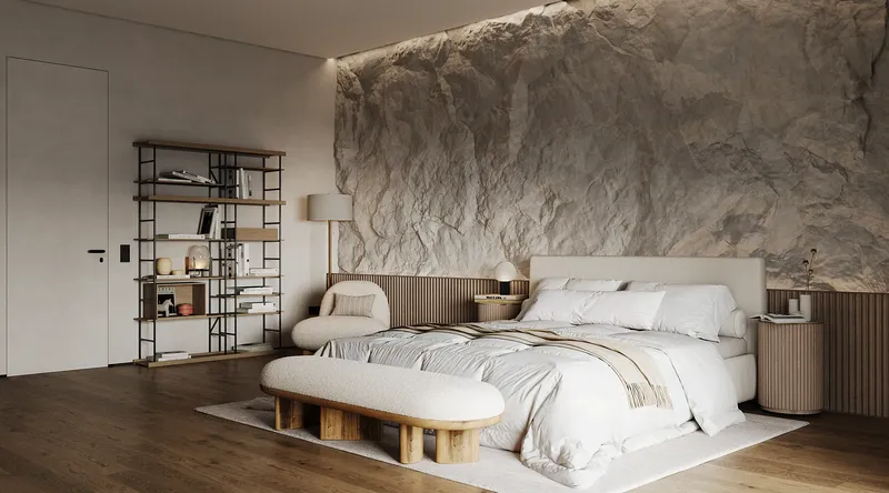 Calming Japandi master bedroom with a low-profile bed, reading nook, and an open wardrobe entrance.