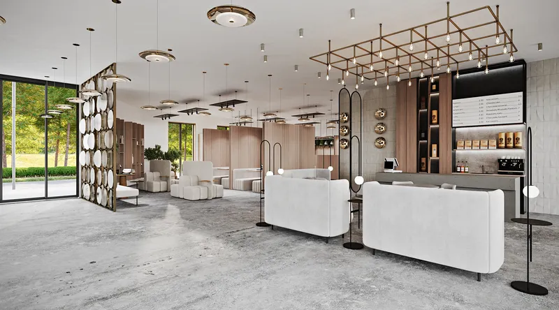 Corner view connecting the cafe's bar and high-back seating with the main entrance lounge.