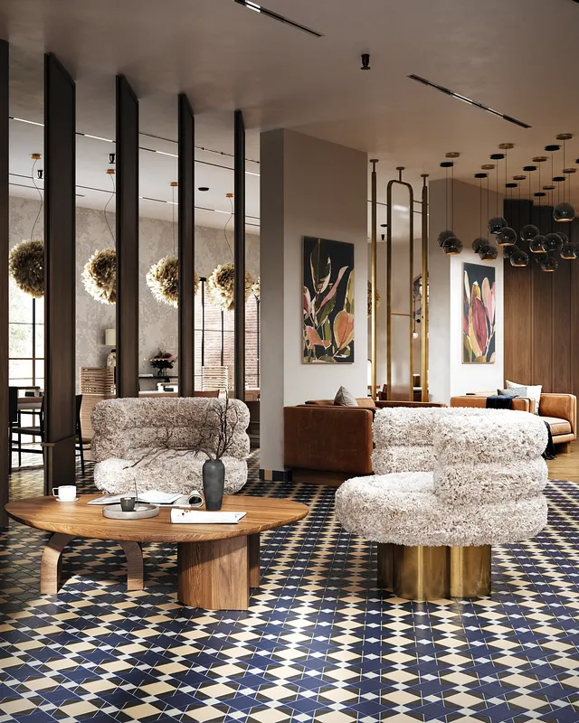 Stylish waiting lounge arrangement with two modern armchairs and a central coffee table.