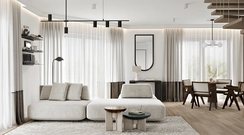 Close-up of a modern sofa group, styled with plush cushions in a bright living room.