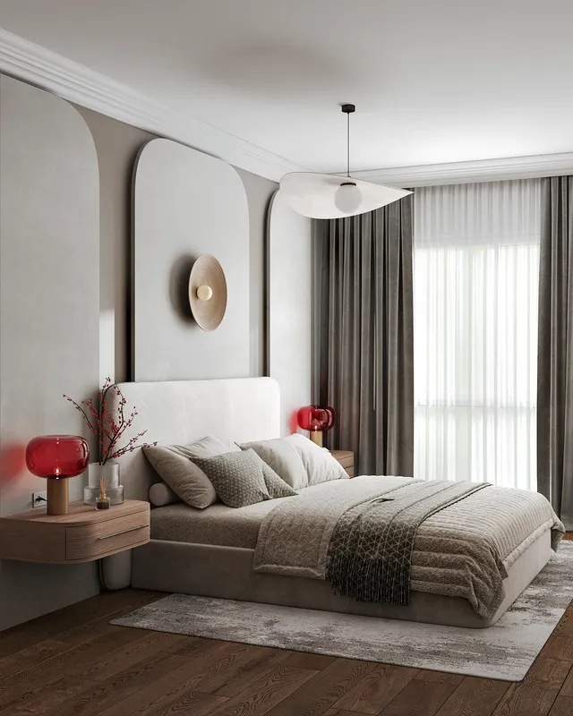 View of a bed and bedside table.